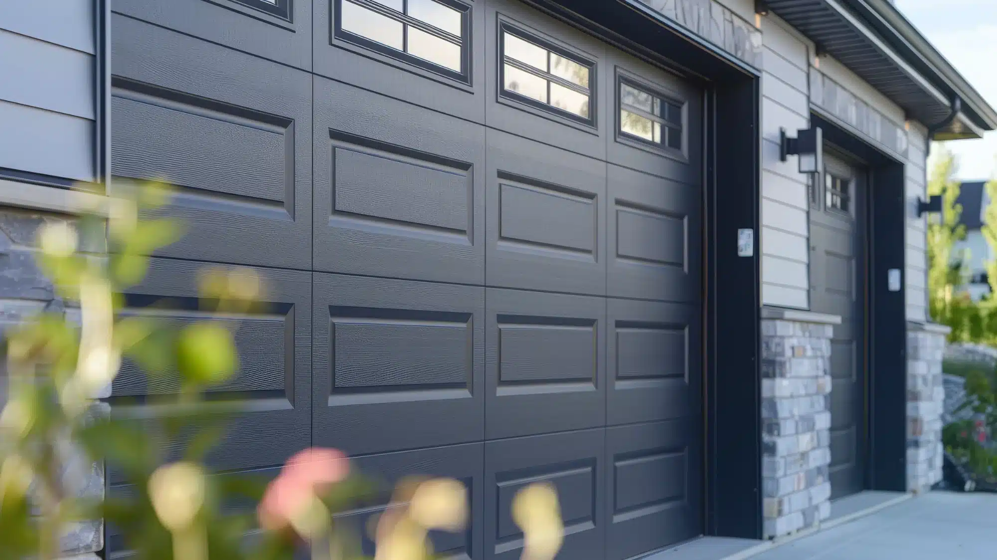 technician repairing overhead garage door in Norwich CT
