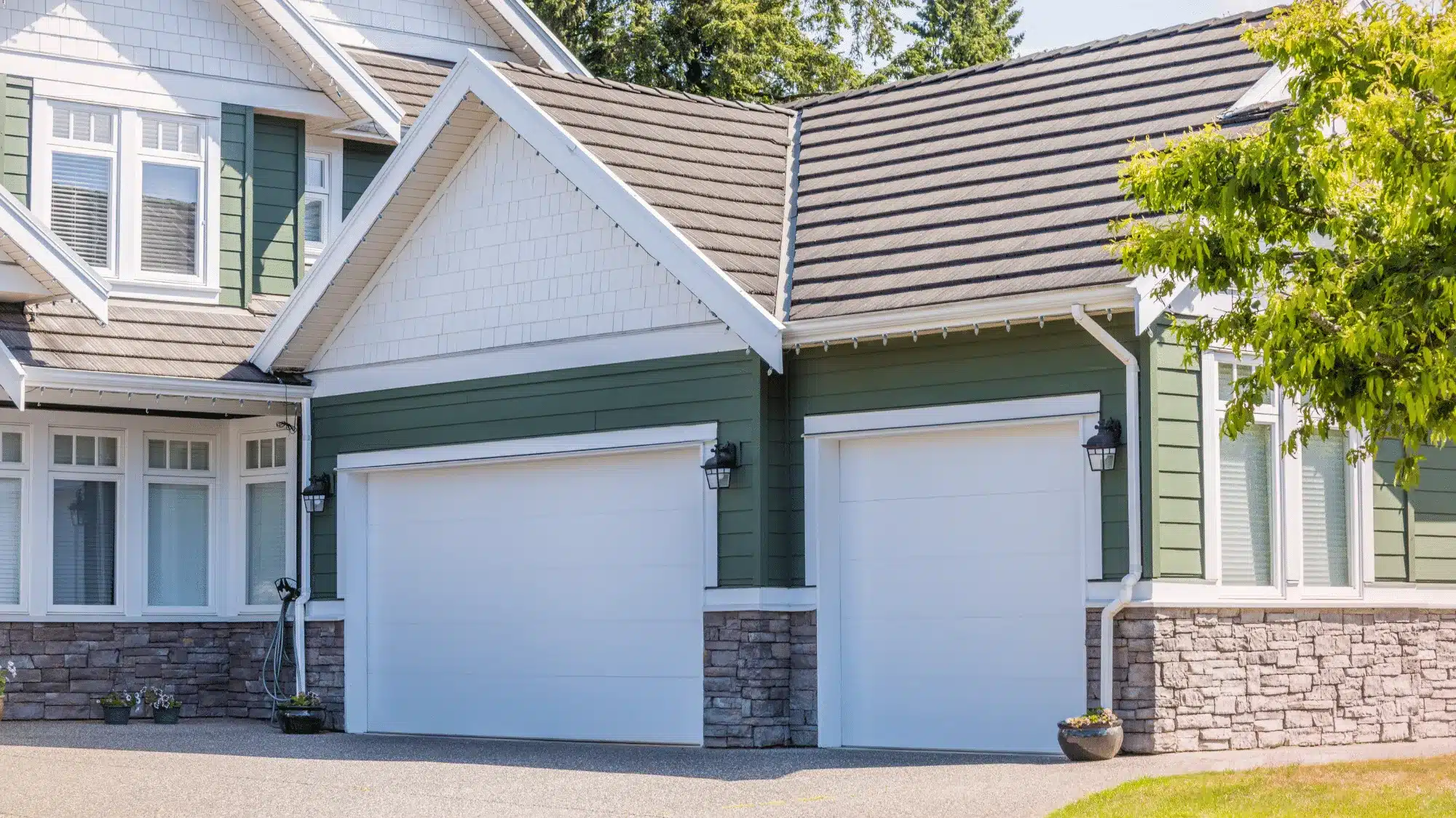 Insulated Residential Garage Door Installed To Improve Energy Efficiency, Temperature Control, And Year-Round Comfort For A Connecticut Home.